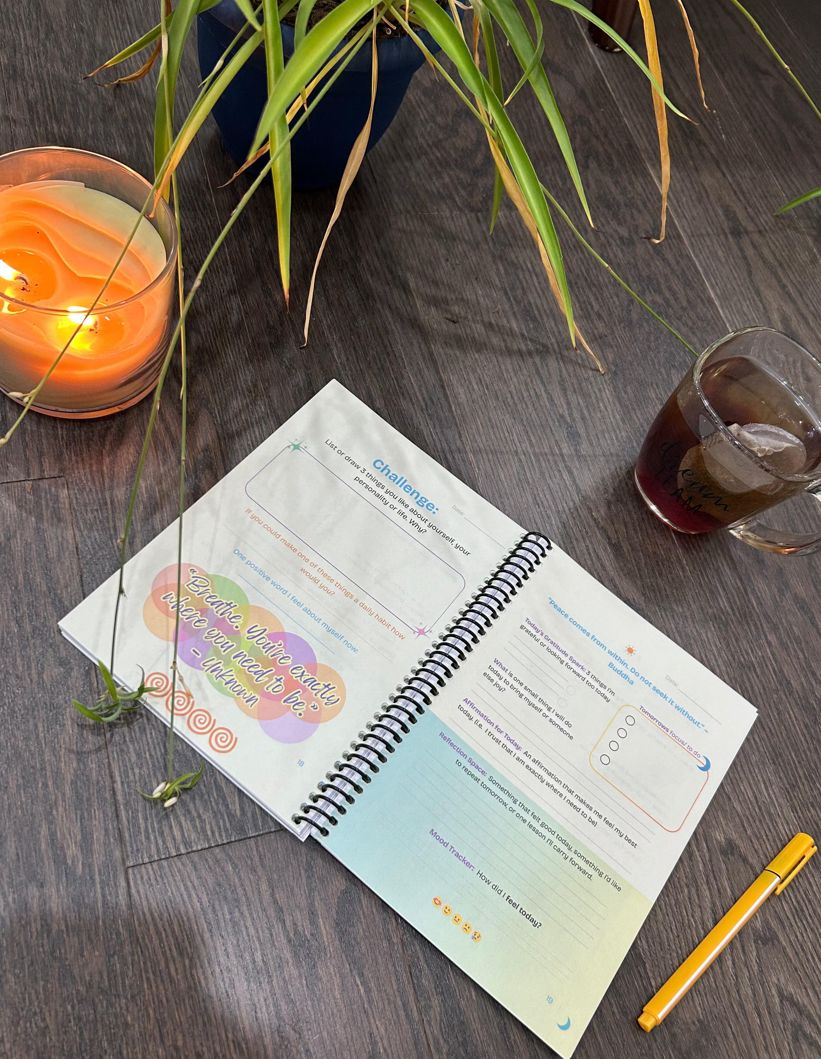 Open flow guided journal by waves wellness on a wooden surface with a candle and plant in the background. Ships US/UK/Canada.
